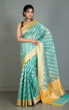 Designer Kora Organza Silk Banarasi Saree in Medium Turquoise with Pastel Yellow and Silver Aara Zari Nakshi Work