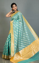 Designer Kora Organza Silk Banarasi Saree in Medium Turquoise with Pastel Yellow and Silver Aara Zari Nakshi Work