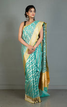 Designer Kora Organza Silk Banarasi Saree in Medium Turquoise with Pastel Yellow and Silver Aara Zari Nakshi Work