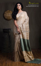 Elegant Natural Gicha Tussar Silk Saree with Geometric Nakshi Weave in Beige and Spanish Green