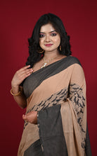 Bengal Handloom Bird Nakshi Motif Brocade Work Soft Begampuri Cotton Saree in Pinkish Tan and Black