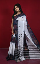 Side view showing pleats, border and striped pallu of the handloom saree