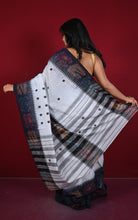 Back view displaying the full striped and ikat pallu of the Begampuri saree