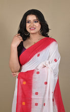 Close-up of red temple border and star motifs on Begampuri saree
