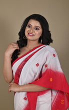 Portrait shot highlighting red border and star buti detail