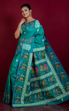 Patachitra Hand Fabric Art on Soft Bishnupuri Katan Silk Saree in Sea Green, Cobalt Bue, Off White and Multicolored