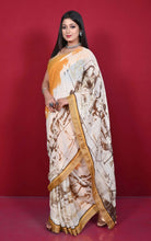 Handwoven Soft Digital Printed High Quality Linen Saree in Pastel Orange, Eggshell White and Crater Brown