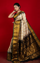 Exclusive Woven Checks Pattern with Mahapar Maharani Border Gadwal Silk Saree in Fawn, Off White, Black and Emerald Green