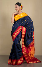 Exclusive Gadwal Silk Saree in Ink Blue, Saffron Yellow, Bright Red and Golden Zari Weave