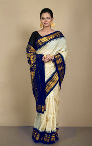 Handwoven Exclusive Gadwal Silk Saree in Off White, Navy Blue and Golden Zari Work