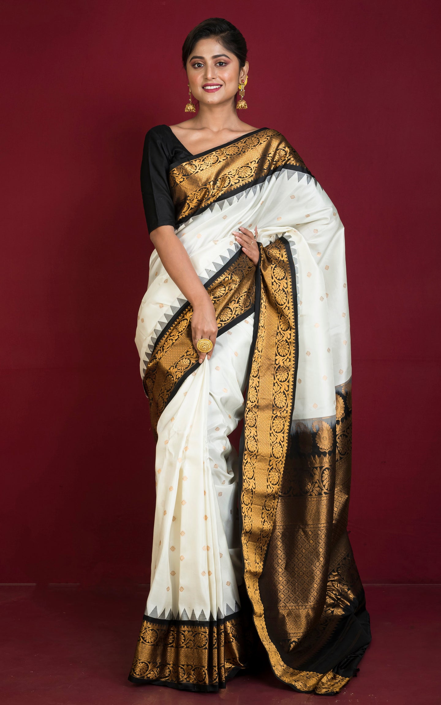 Handwoven Exclusive Gadwal Silk Saree in Off White, Black and Golden Zari Work