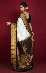 Handwoven Exclusive Gadwal Silk Saree in Off White, Black and Golden Zari Work