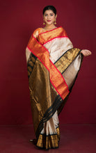 Exclusive Gadwal Silk Saree in Champagne, Red, Black and Golden Zari Weave
