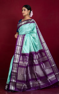 Handwoven Exclusive Gadwal Silk Saree in Aqua Green, Luxury Purple and Silver Zari Work