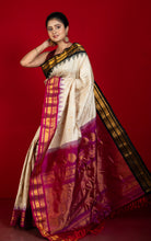 Exclusive Woven Ganga Jamuna Border Gadwal Silk Saree in Pearl Bush, Onyx Black, Purplish Red and Golden Zari Weave