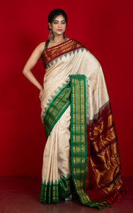 Exclusive Woven Ganga Jamuna Border Gadwal Silk Saree in Almond Beige, Dark Maroon, Dartmouth Green and Golden Zari Weave