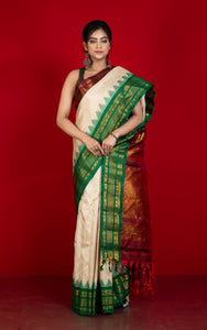 Exclusive Woven Ganga Jamuna Border Gadwal Silk Saree in Almond Beige, Dark Maroon, Dartmouth Green and Golden Zari Weave