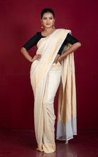 Handwoven Medium Border Khaddi Georgette Banarasi Saree in Titan White and Cashmere Gold