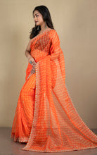 Bold and Fashionable Soft Organza Zardozi Silk Saree in Orange and Beige