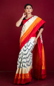 Designer Skirt Border Ikkat Pochampally Silk Saree in Off White, Red, Fire Orange, Black and Antique Golden