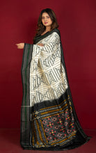 Exclusive Twill Ikkat Pochampally Silk Saree with Madhathasu Pallu in Off White, Black, Dark Green and Multicolored