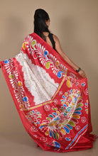 Hand Batik Printed Soft Semi Gicha Silk Saree in Off White. Red and Multicolored