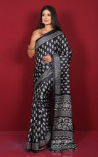 Printed Soft Semi Gicha Silk Saree in Black and Off White