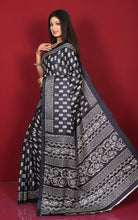 Printed Soft Semi Gicha Silk Saree in Black and Off White