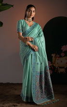 Title
Soft Cotton Woven Ajrakh Jamdani Saree Thread Nakshi Work in Sea Green and Multicolored
