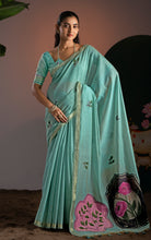 Sea green handwoven soft Jamdani saree with botanical medallion pallu, full-length front view model shot.

Target Keywords: sea green jamdani s