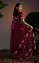 Back view featuring the matching blouse design and coordinated woven motifs.
