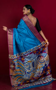 Indulge in the luxurious feel of our Kalamkari Printed Tussar Silk Saree. Adorned with a stunning royal blue and purple color palette and hand-crafted Kalamkari print, this saree exudes sophistication. The rich matte finish zari border adds a touch of elegance, making it the perfect addition to your wardrobe.