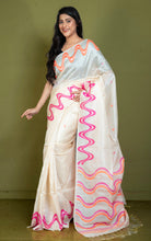 Finest Quality Designer Ivory Handwoven Tussar Silk Saree with Pink & Coral Wave Design and Tassel Border