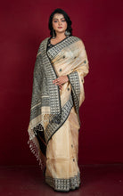 Premium Quality Tussar Silk Woven Warli Nakshi Work Saree in Beige and Black