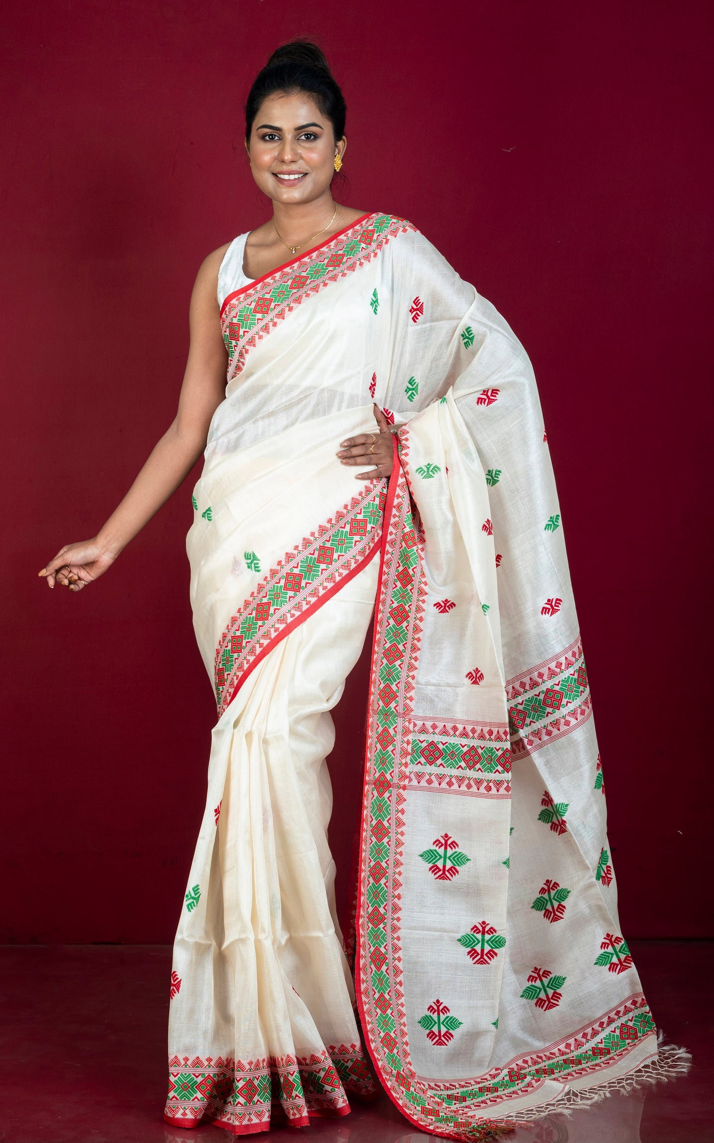 Premium Quality Assamese Nakshi Motif Inspired Handwoven Work on Tussar Silk Saree in Off, Red and Green