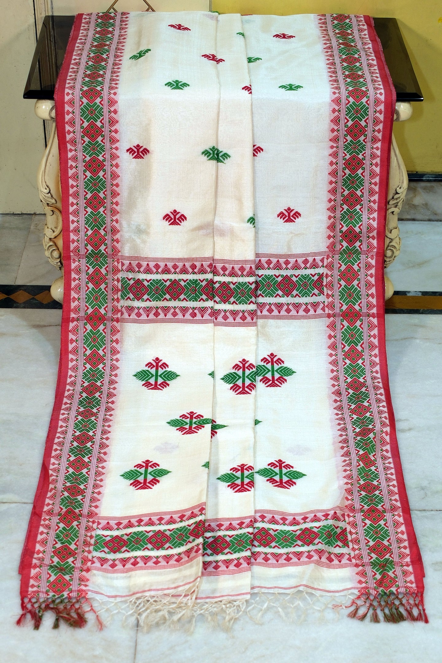 Premium Quality Asamese Nakshi Motif Inspired Handwoven Work on Tussar Silk Saree in Off, Red and Green