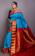 Exclusive Gadwal Silk Saree in Maya Blue,Twill Rani Pink and Golden Zari Work