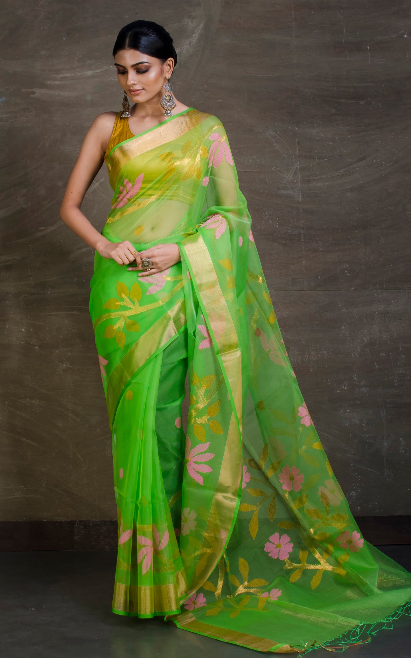 Skirt Border Work Muslin Jamdani Saree in Parrot Green and Multicolored Thread Work