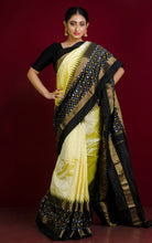 Designer Skirt Border Ikkat Pochampally Silk Saree in Cream, Black and Antique Gold