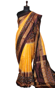 Designer Skirt Border Ikkat Pochampally Silk Saree in Yolk Yellow, Mahogany Brown and Silver White